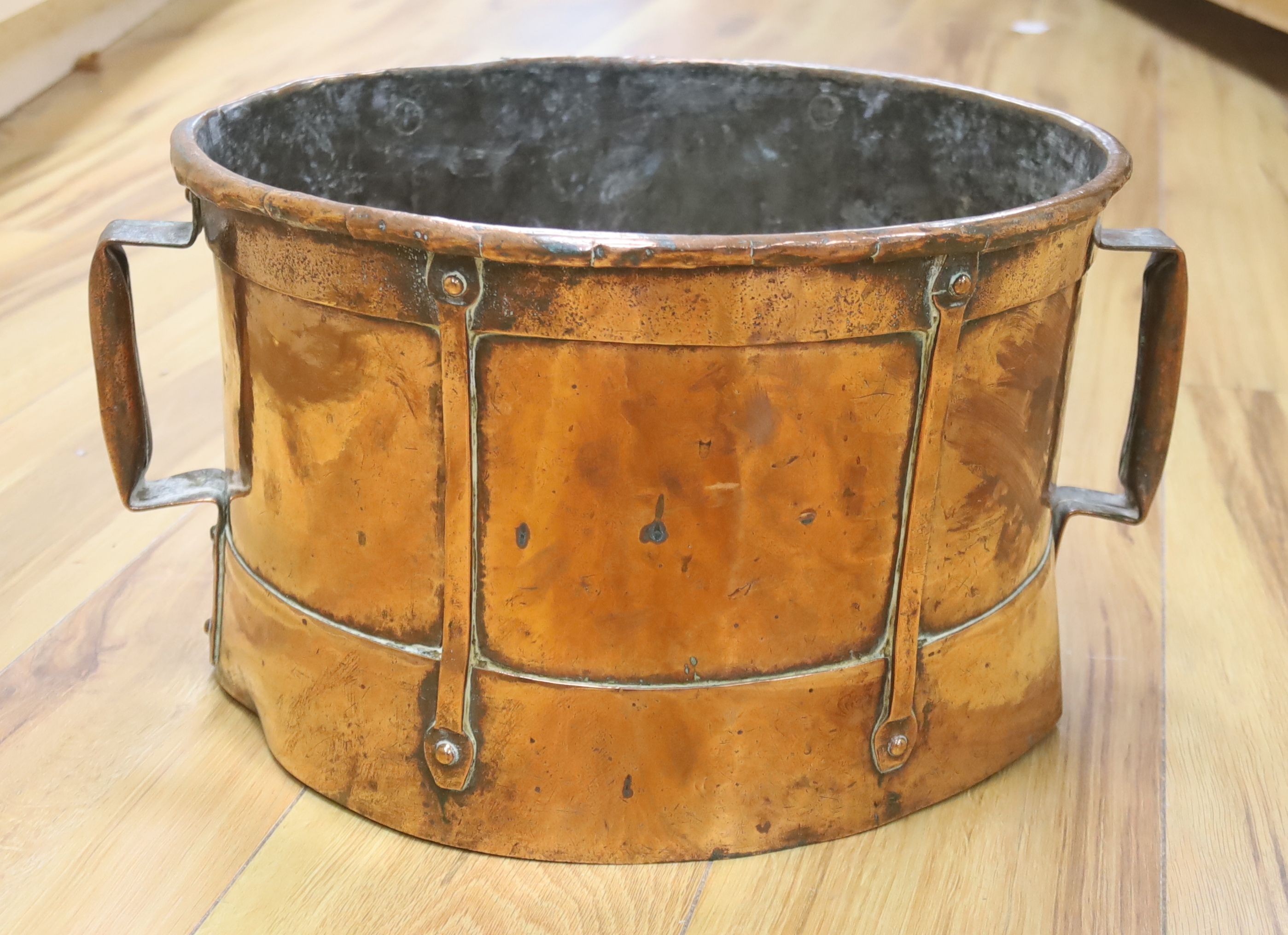 An Art Nouveau copper two handled planter, 38cm